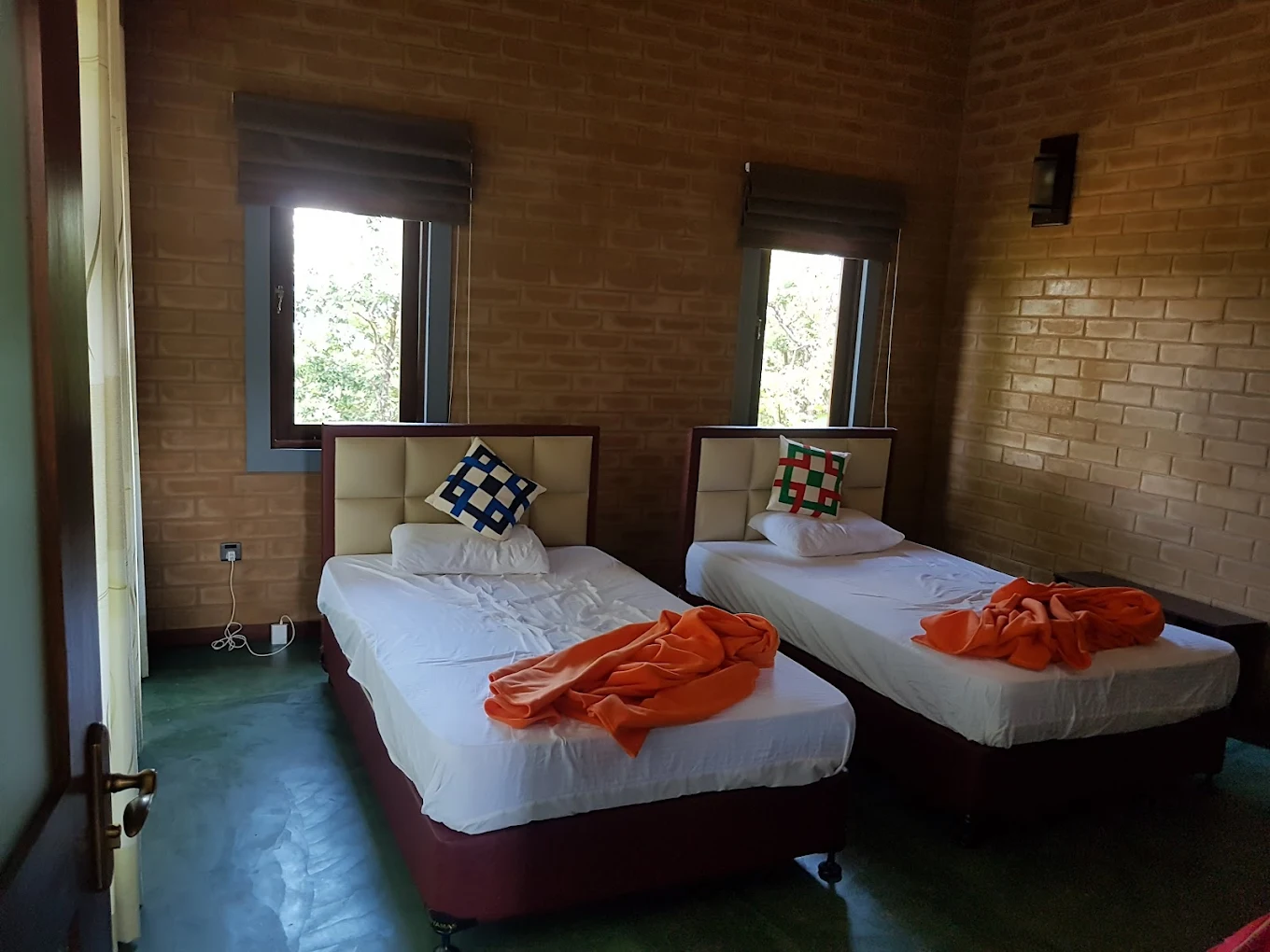 brick-villa-twin-bedroom-windows